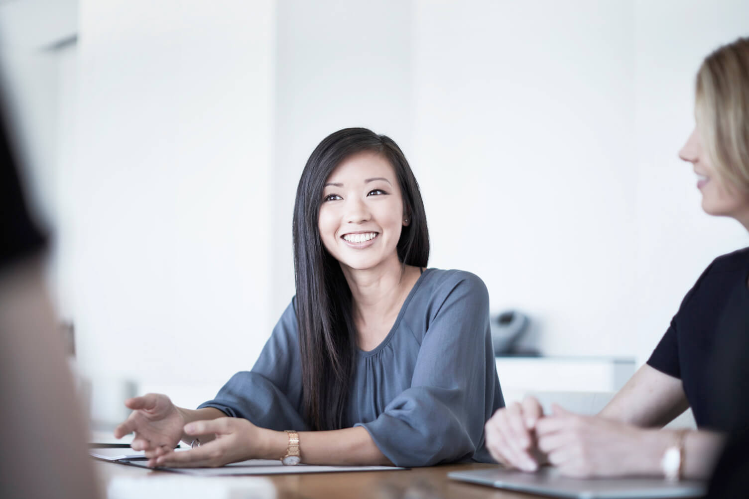 Smiling businesswoman in meeting