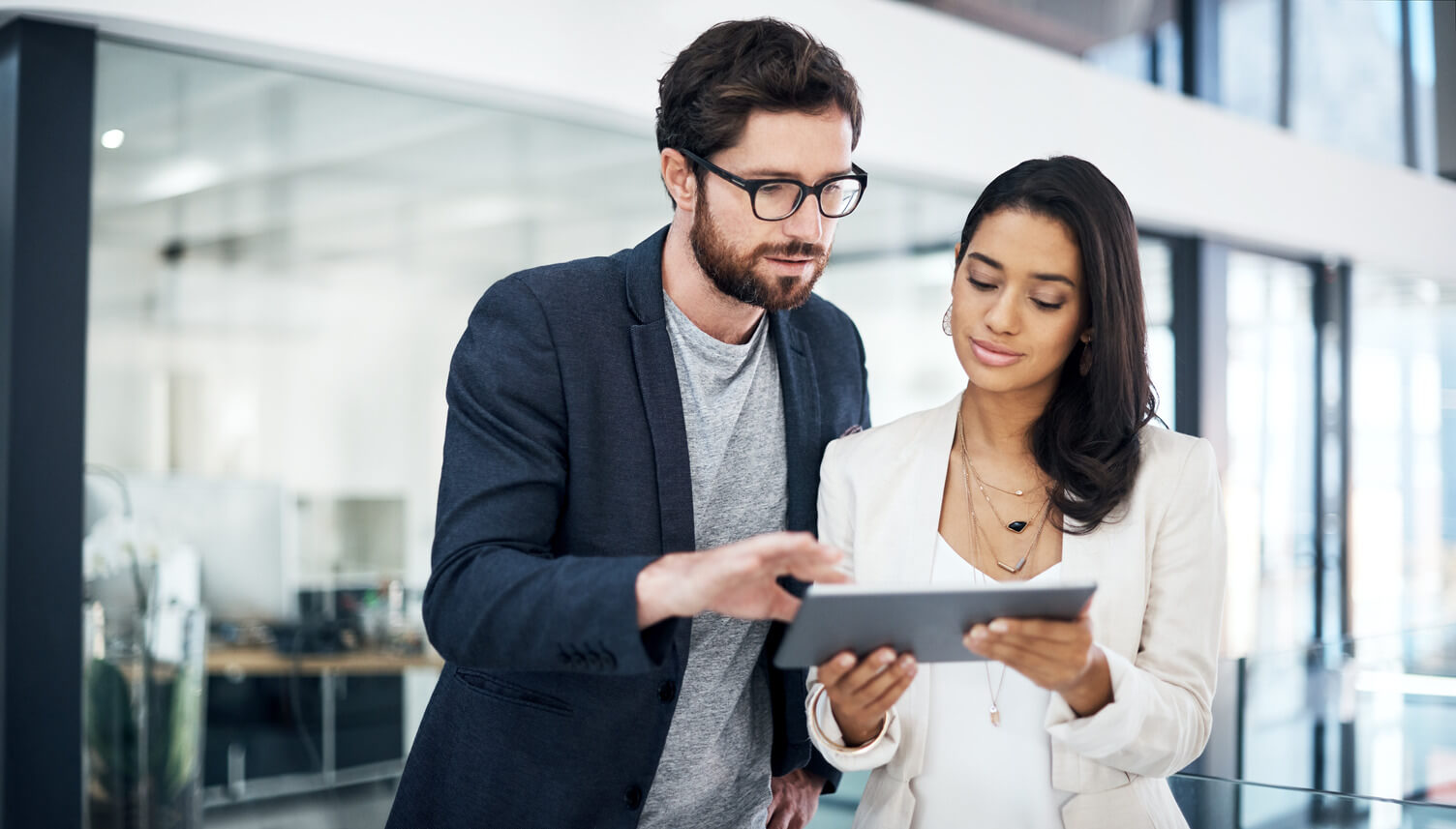 Man and woman with a tablet